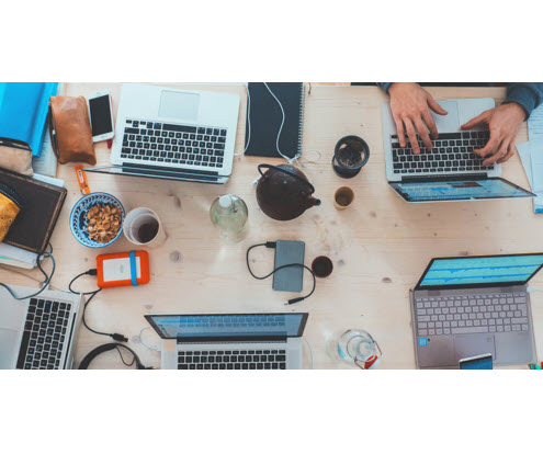 table with computers on it