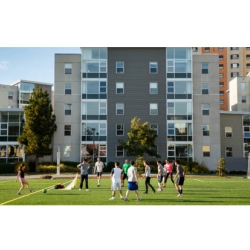 students playing sports on west campus green